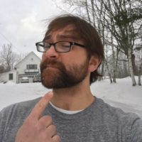Jake - A bearded fellow with glasses outside in the snow